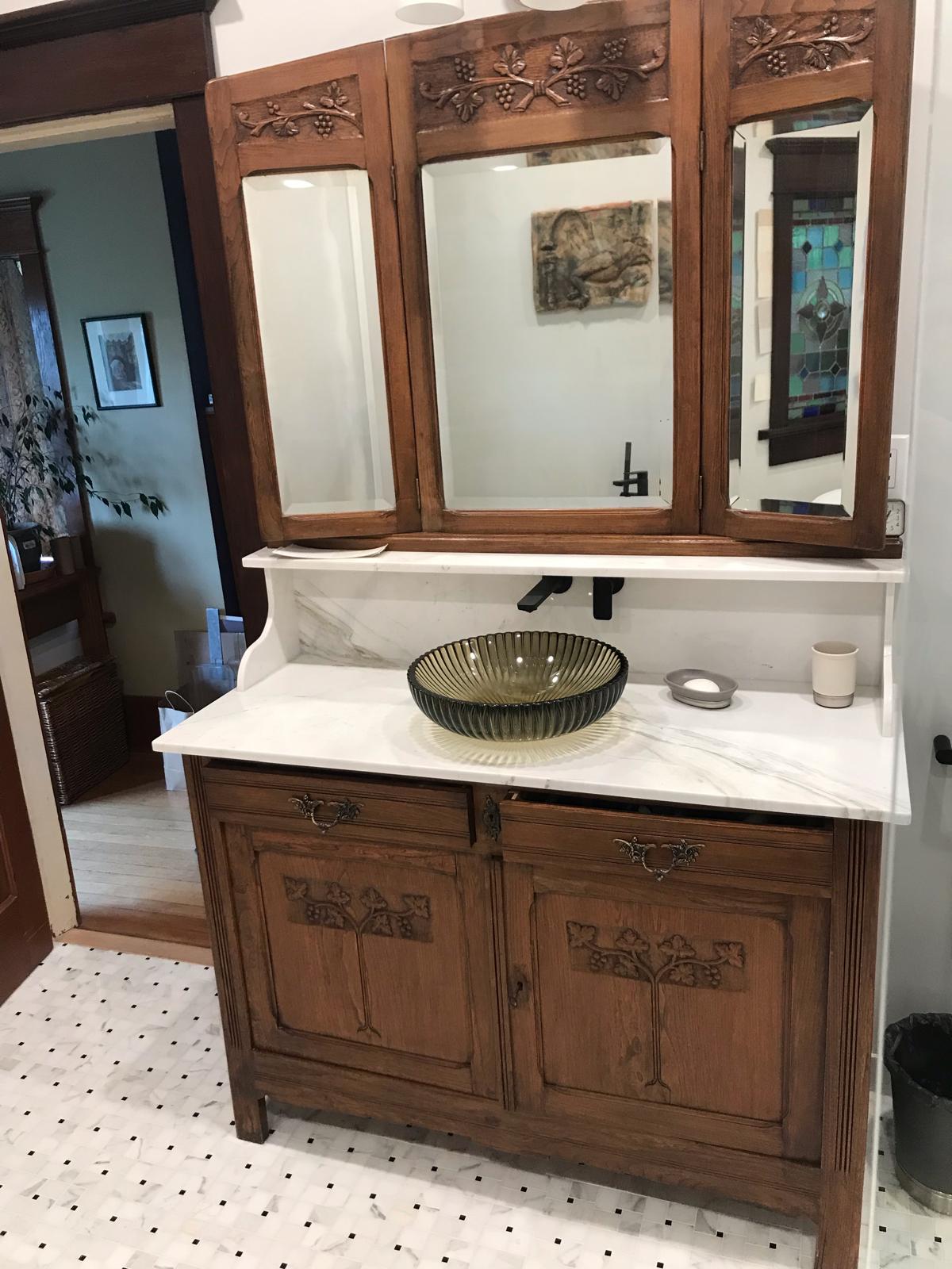 Antique wooden vanity with marble top restored in Marble Heritage Vanity Restoration project